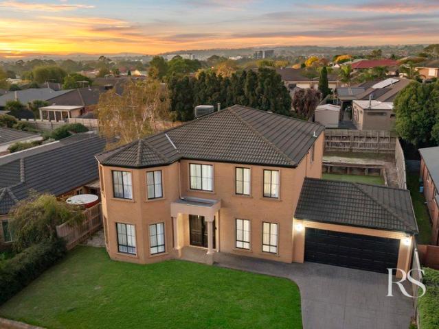 Stunning Family Home with Commanding Presence!