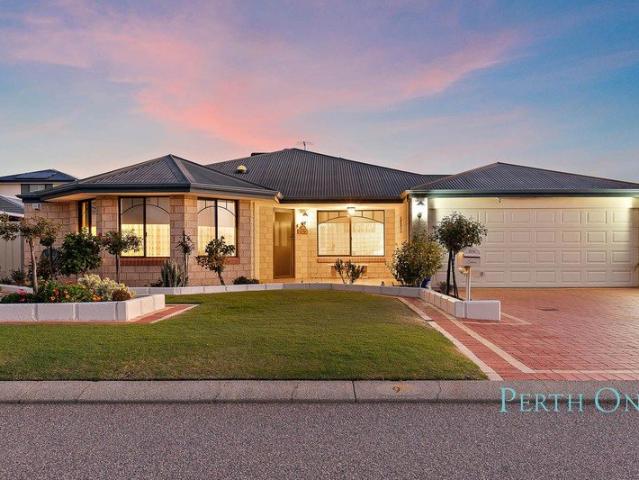 Stunning Family Home with Huge Garage, Solar Power & Low Maintenance Living
