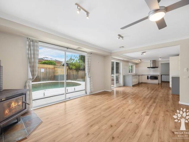 Stunning Family Home with Solar Power & EV Charging Elegant Yard, Pool & Prime Location!