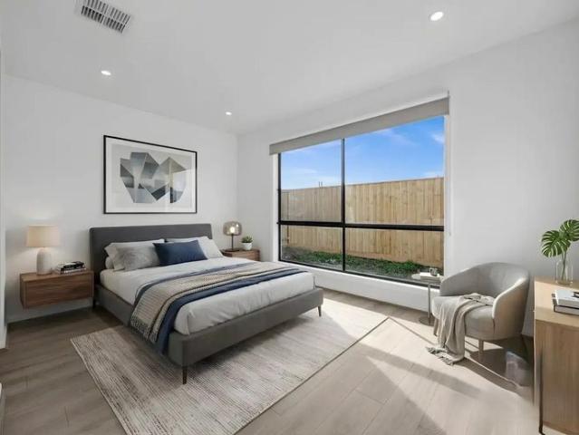 Stunning Four Bedroom Home with Two Master Suites!