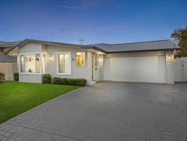 Stunning Hamptons Transformation in a Sought After Lakeside Pocket