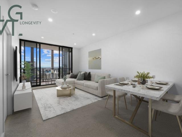STUNNING HIGH RISE TWO BEDROOM w/PARKING FOR SALE