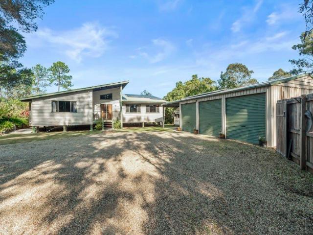 STUNNING HOME ON STUNNING ACREAGE