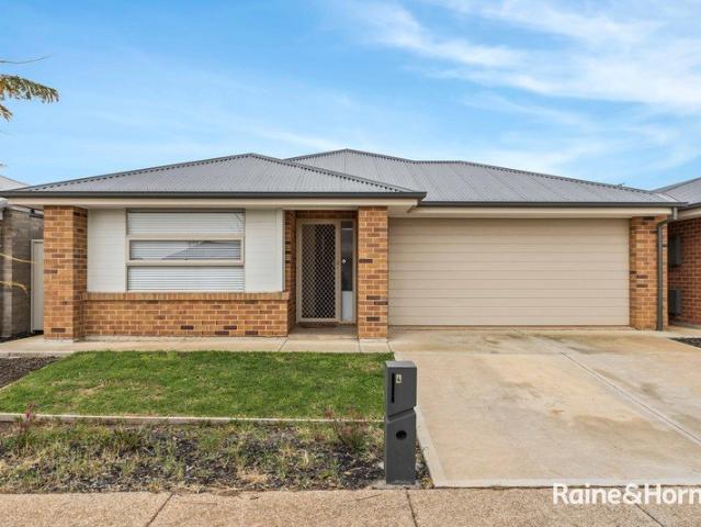 Stunning home combines modern architecture with comfortable living!