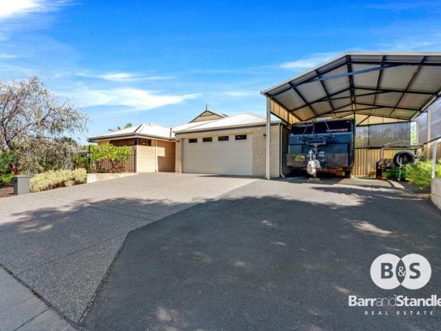 Stunning Home with Abundant Features and Parkland views