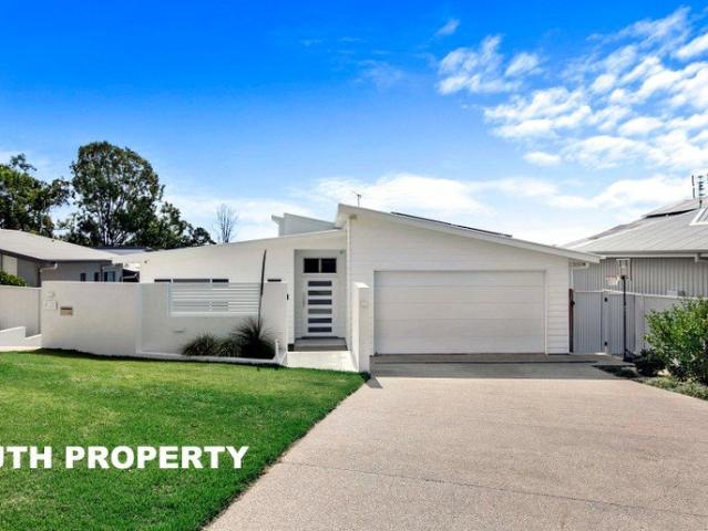 STUNNING HOME WITH SWEEPING VIEWS!