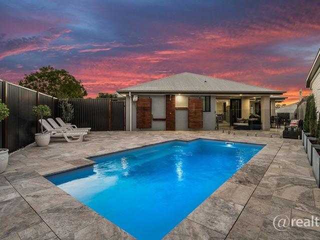 STUNNING & IMMACULATE WARNER LAKES ENTERTAINER'S PARADISE! POOL + HUGE ENTERTAINING TERRACE + 6.6KW SOLAR!