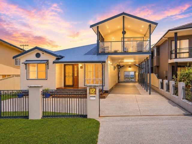 Stunning Lakefront Entertainer with Space, Style & Views