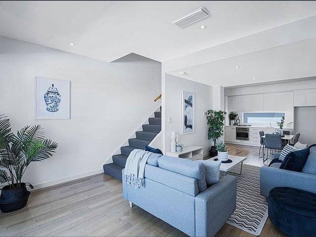 STUNNING LIGHT FILLED 3 LEVEL TOWNHOUSE