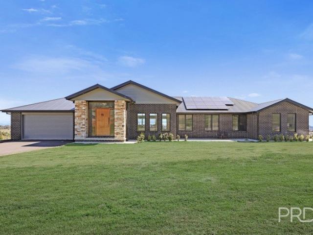 Stunning Outlook | Spacious Family Living | Separate Downstairs Retreat