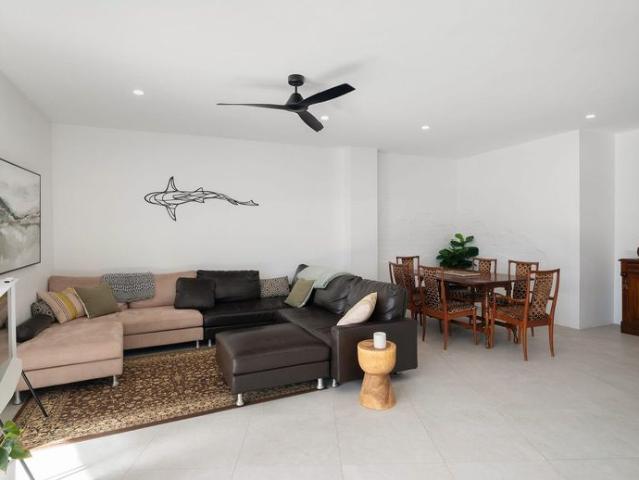 STUNNING RENOVATED APARTMENT WITH CITY & WATER VIEWS, HOME OFFICE & OVERSIZED GARAGE