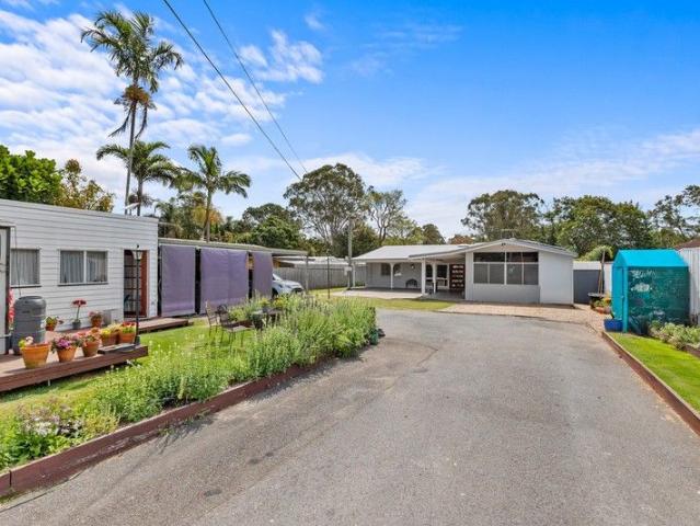 Renovated Family Haven on a Rare Half Acre Block with Endless Potential