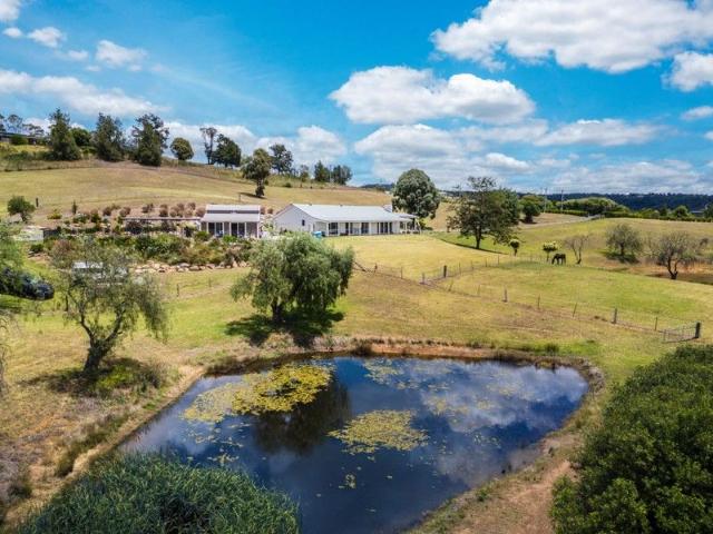 Stunning renovation with a spectacular outlook! 8.67 acres!