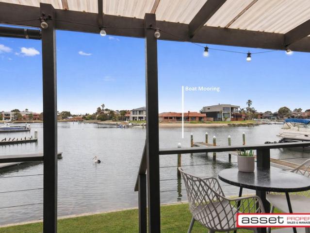 Stunning Single Level Waterfront with Boat Mooring