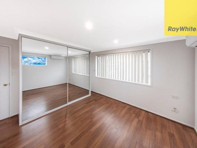Stunningly Renovated 5 Bedroom Family Oasis with Pool and Garage!