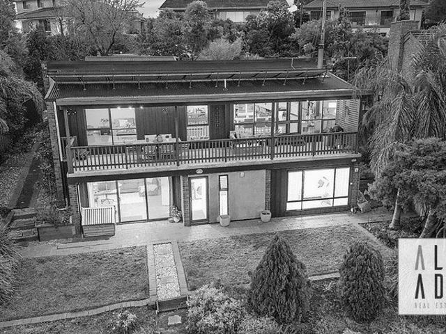 Style, Comfort & Panoramic Views Transformed Mid Century Masterpiece