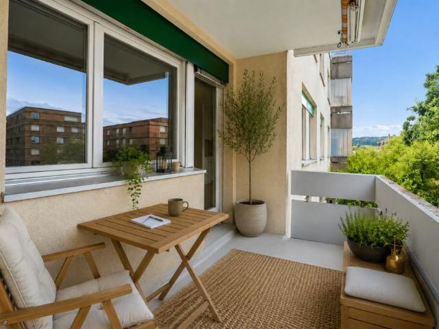RESERVIERT: Stylisch renovierte 3½ Zimmer Wohnung mit Balkon und grünem Ausblick