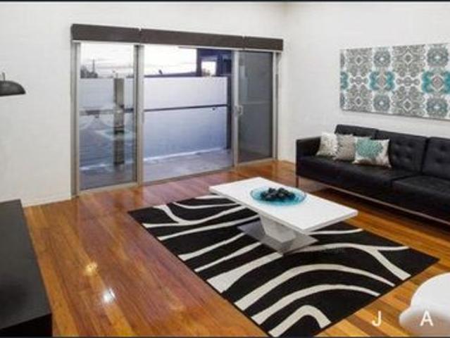Stylish Multi Level Townhouse with CBD Views in the Heart of West Melbourne