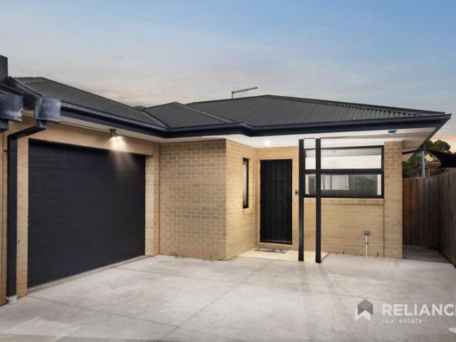 Stylish Modern Unit with Premium Finishes & Private Backyard