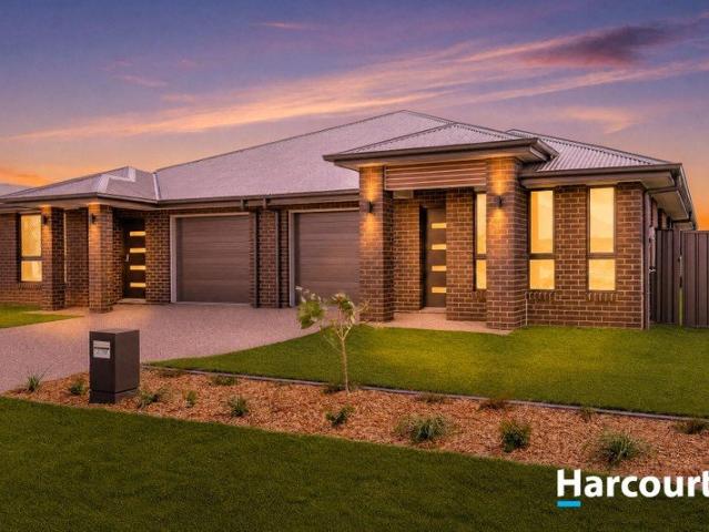 Stylish New 4 Bedroom Duplex Just Moments from the Beach