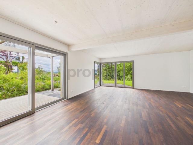 Stylish new build single family home in sustainable timber construction with natural garden and Alpine views