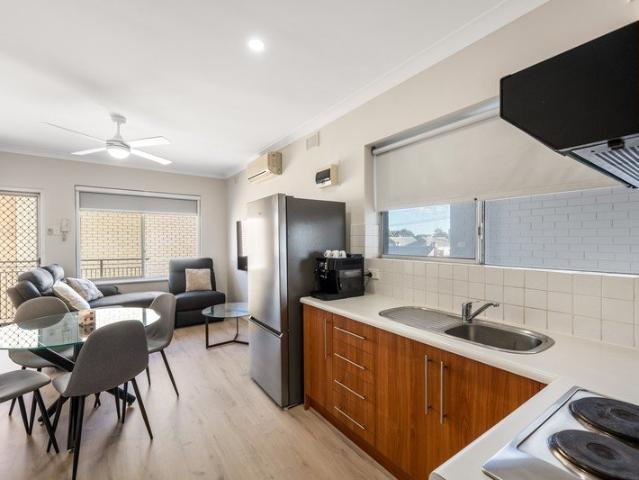 Stylish, Newly Renovated Unit Offering Comfort & Convenience