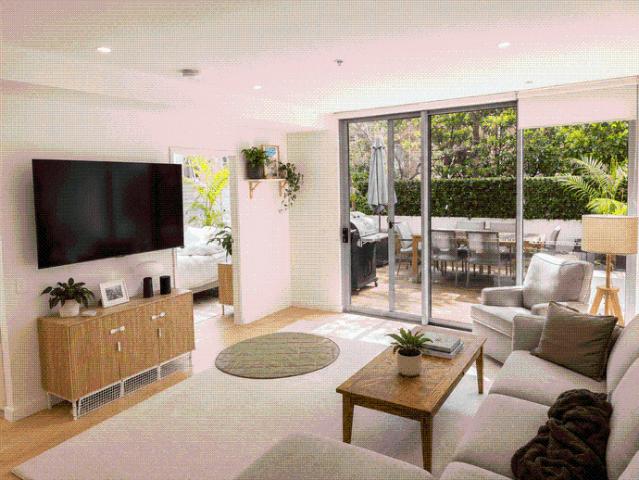 STYLISH NORTH FACING APARTMENT WITH PRIVATE OUTDOOR LIVING