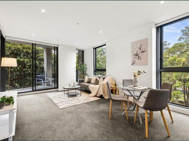 Stylish north facing in prized Olympic Park address with Oversized Storage Cage Creating Rare Tandem Parking Opportunity