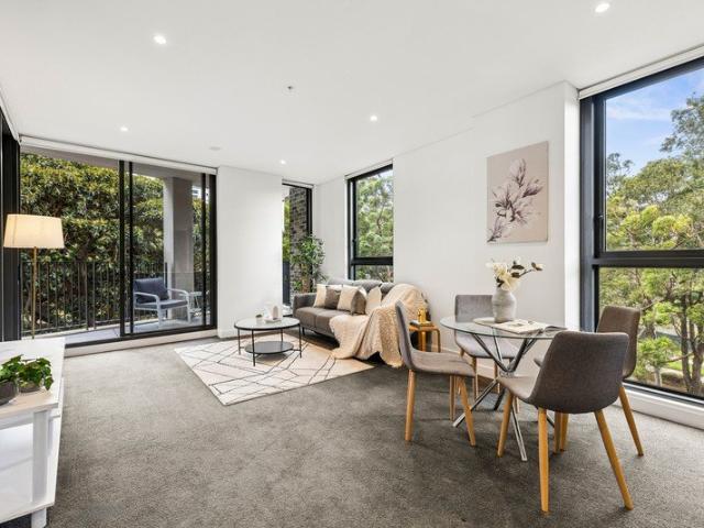 Stylish north facing in prized Olympic Park address with Oversized Storage Cage Creating Rare Tandem Parking Opportunity
