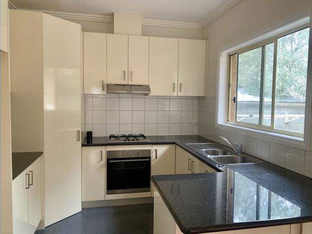 Stylish One Bedroom Unit with Remote Garage & Private Courtyard