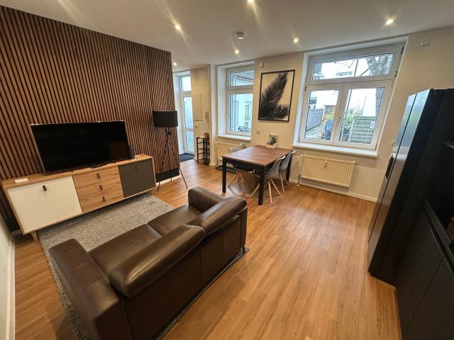 Stylish and quiet ground floor apartment in a quiet backyard