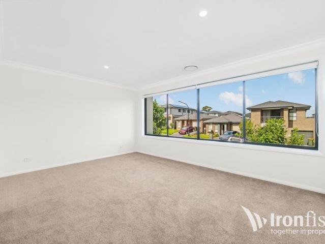 Stylish and spacious four bedroom, three bathroom townhouse located in a peaceful location in Riverstone!