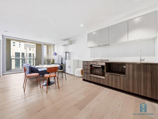 Stylish 1 Bedroom + Study Apartment with Car Space in the Heart of Docklands