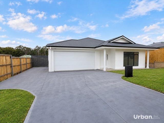 Stylish Brand New Home with Upgraded Features with room to park your Van!
