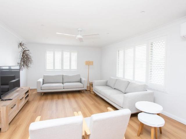 Stylish Coastal Apartment Just Steps from Beach, Creek & Shops