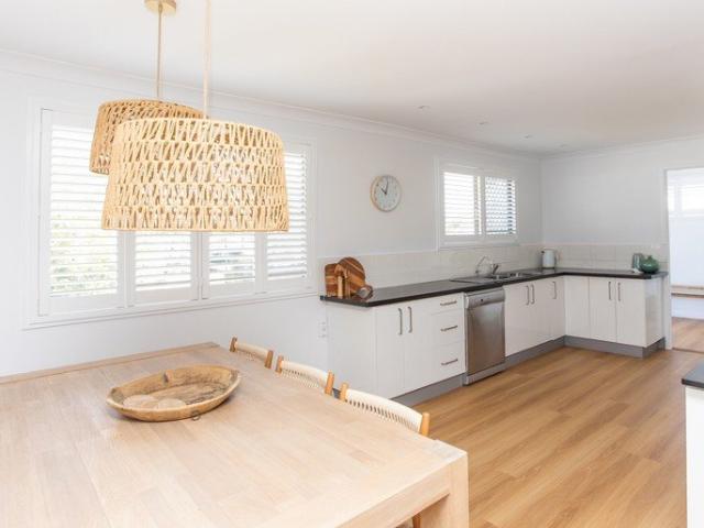 Stylish Coastal Apartment Just Steps from Beach, Creek & Shops