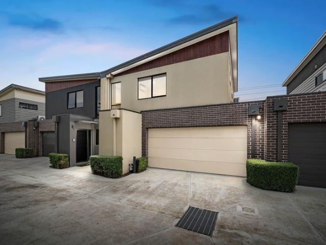 Stylish Coastal Living Just Moments from the Bay