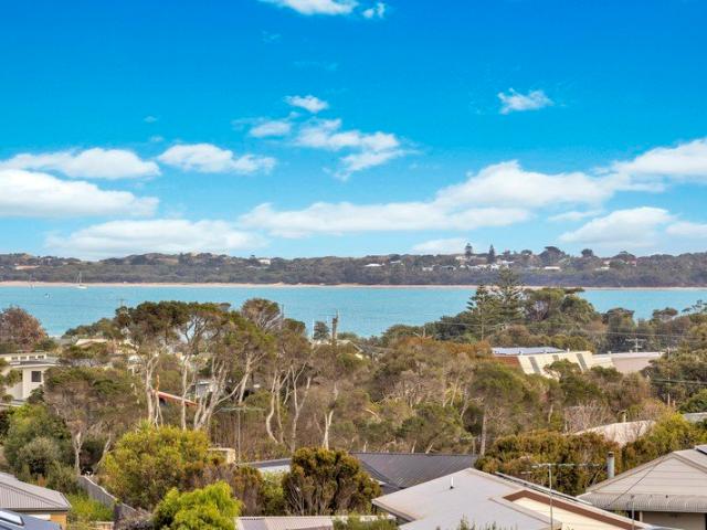 STYLISH COASTAL LIVING WITH PANORAMIC WATER VIEWS