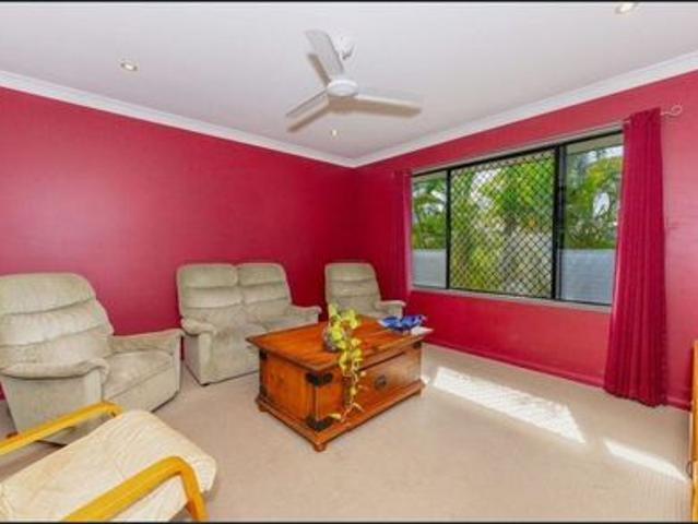Stylish Coastal Retreat – Four Bedroom Home with Multiple Living Areas Solar in Beautiful Bushland Beach!
