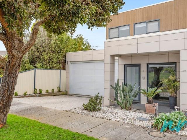 Stylish Coastal Townhome with Flexible Living & Bayside Convenience