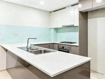 Stylish & Convenient One Bedroom Apartment in the Heart of Campsie with Spacious Balcony Access on Troy St