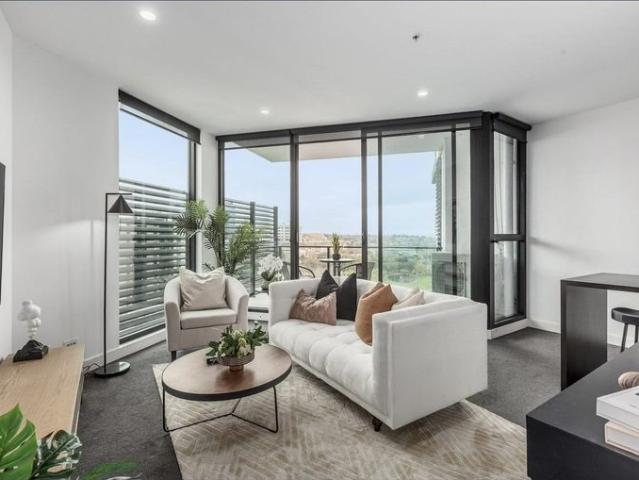 Stylish Corner Apartment with Breathtaking Views in Box Hill