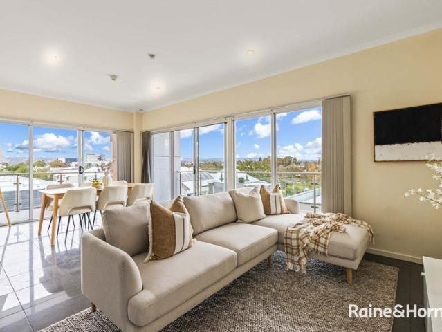Stylish Corner Apartment with Parkland Views in Prime Mawson Lakes Location