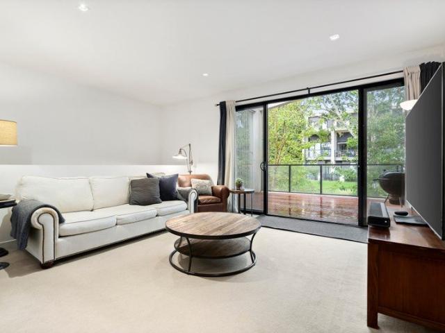 Stylish Dual Level Living with Spacious Indoor Outdoor Appeal