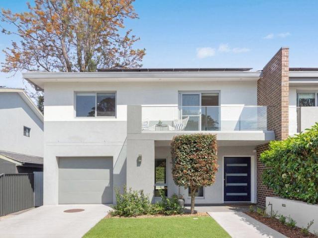Stylish Duplex Showcasing Contemporary Style and Family Comfort