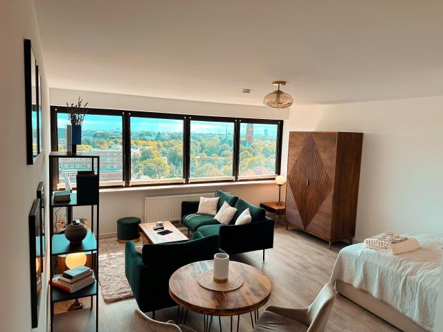 Stylish designer apartment with panoramic 11th floor view