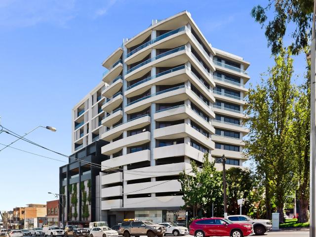 Stylish Elevated Living with Balcony and Car Space