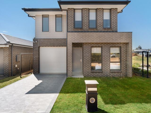 Stylish Fully Furnished Austral Home with Solar Battery, EV Charger & Low Electricity Costs