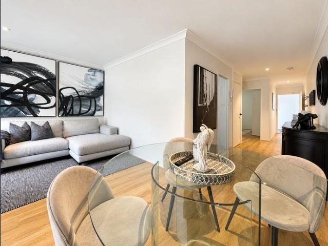 Stylish fully renovated top floor apartment with separate study