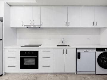 Stylish Fully Renovated Apartment Moments from Box Hill Central